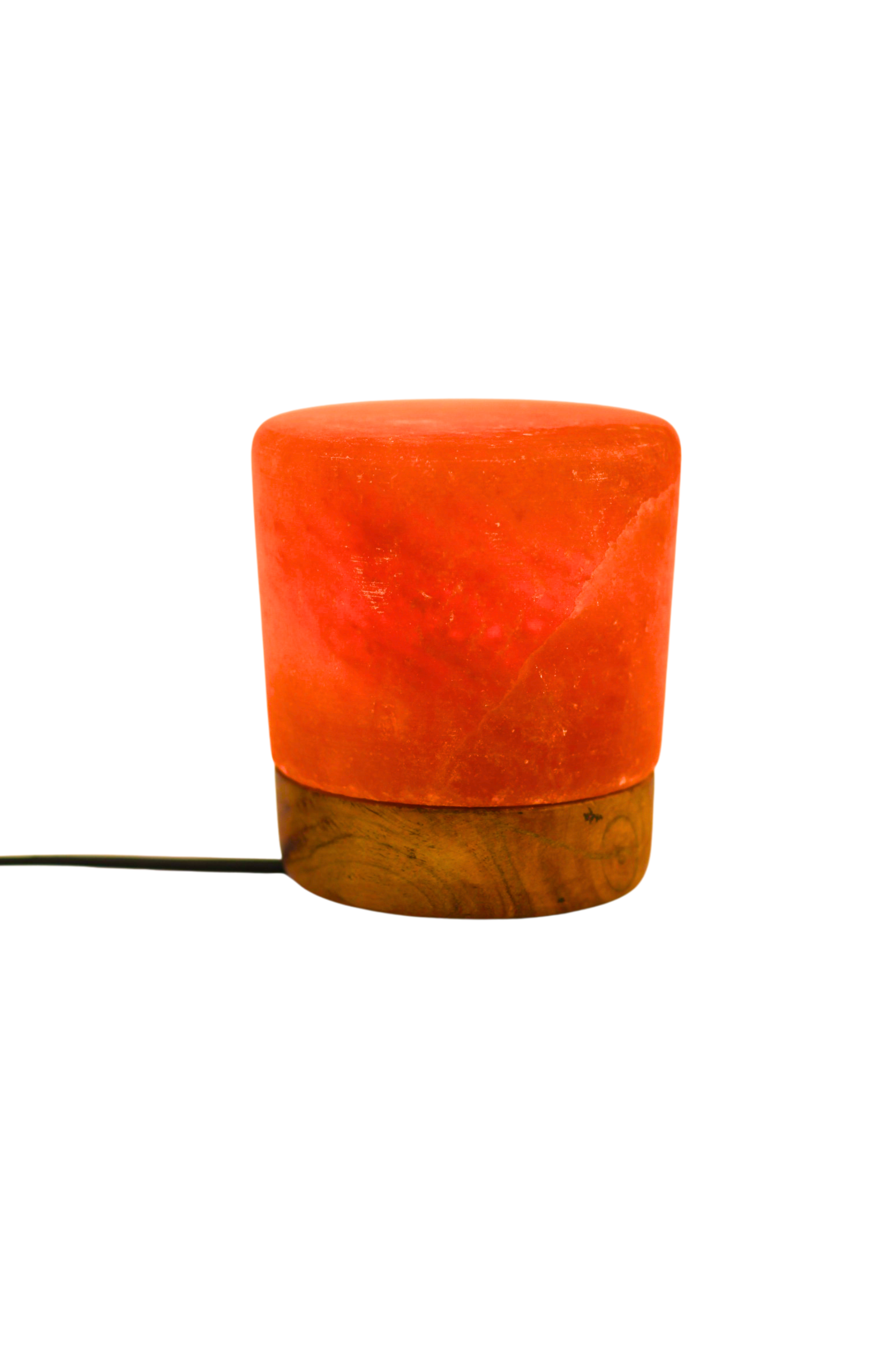 Lamp with a wooden base and pinkish-orange glass on a white background